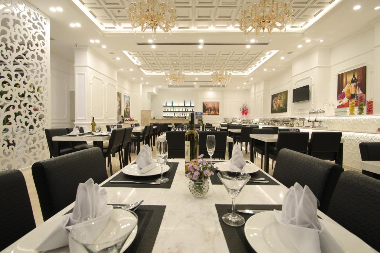 Acnos Grand Hotel Хошимин Экстерьер фото