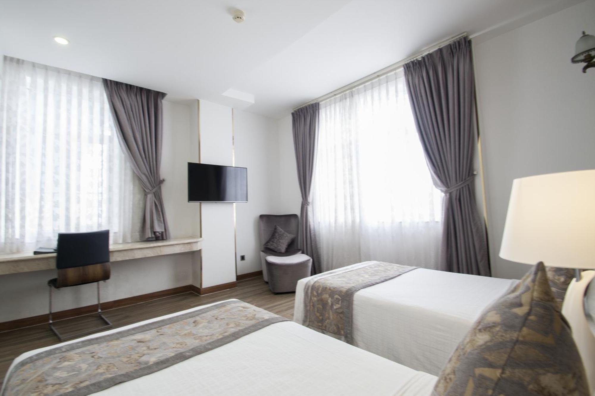Acnos Grand Hotel Хошимин Экстерьер фото